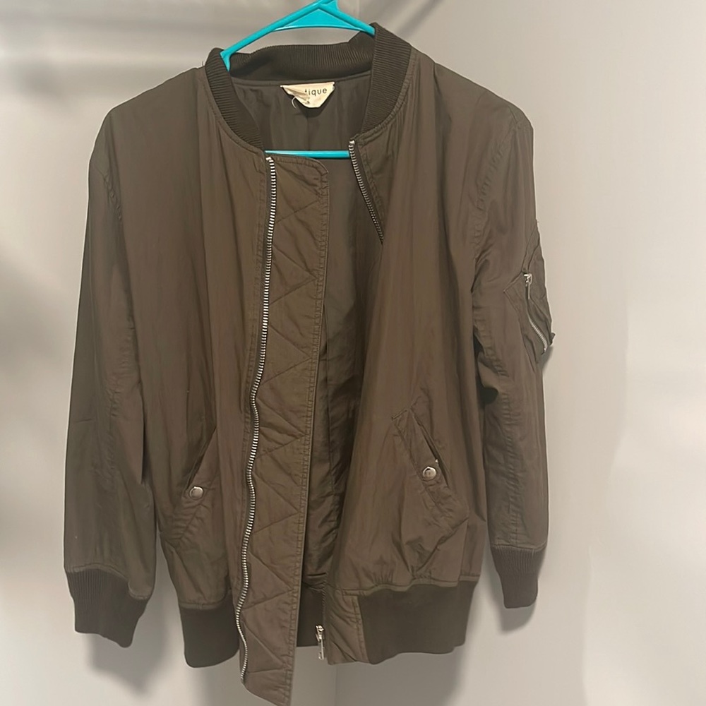 Vestique olive green jacket size S.